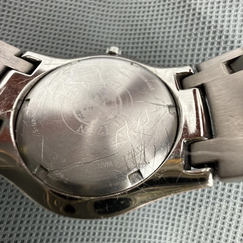 Citizen Eco-Drive Titanium E111 Solar Men's Japan Watch New Orig Battery Cell